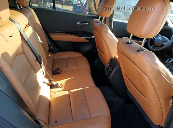 1GYFZDR43SF147694 2025 CADILLAC XT4 Серебряный Вид задней части салона