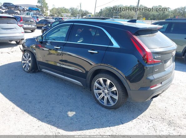 1GYFZDR46LF075293 2020 CADILLAC XT4 Black Rear left
