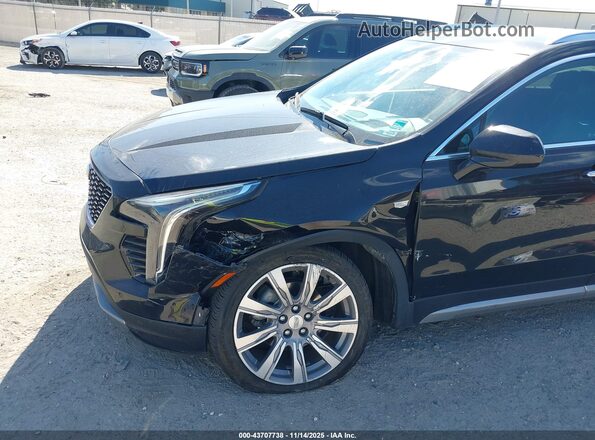 1GYFZDR46LF075293 2020 CADILLAC XT4 Black Front view