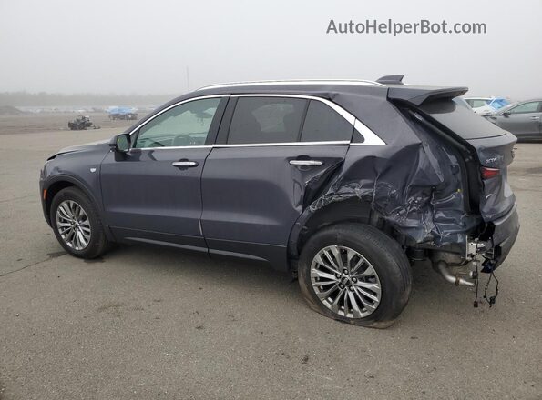 1GYFZDR46RF135372 2024 CADILLAC XT4 Blue უკანა მარცხენა