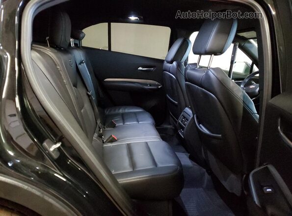 1GYFZDR47LF128163 2020 CADILLAC XT4 Black Rear interior view