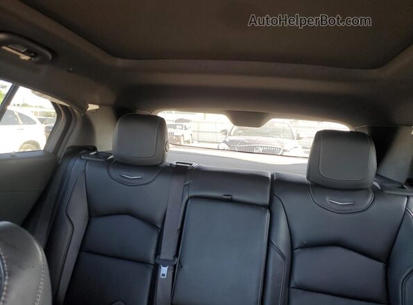 1GYFZDR48LF028721 2020 CADILLAC XT4 White Widok tylnych siedzeń