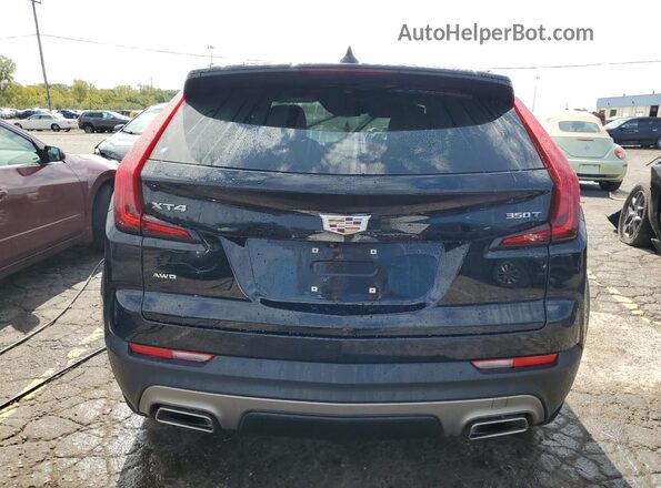 1GYFZDR48MF062000 2021 CADILLAC XT4 Black უკანა ხედი