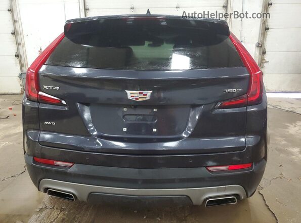 1GYFZDR48PF110244 2023 CADILLAC XT4 Черный Вид сзади
