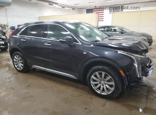1GYFZDR48PF110244 2023 CADILLAC XT4 Черный Передняя правая четверть