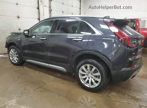 1GYFZDR48PF110244 2023 CADILLAC XT4 Черный Задняя левая четверть