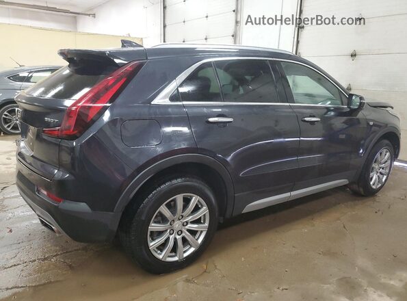 1GYFZDR48PF110244 2023 CADILLAC XT4 Черный Задняя правая четверть