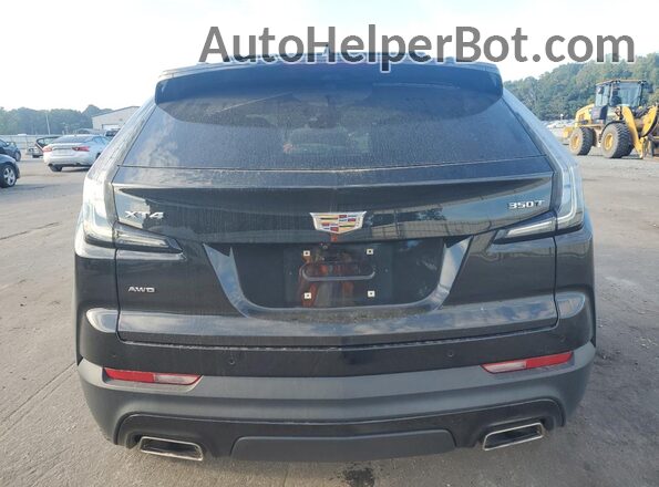 1GYFZFR40MF001669 2021 CADILLAC XT4 Black Rear view