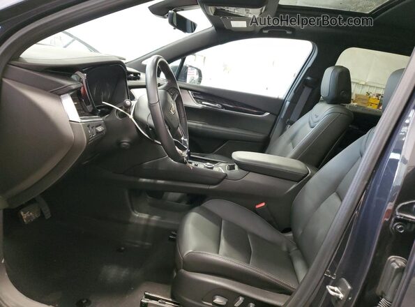 1GYKPDRS6PZ173330 2023 CADILLAC OTHER Gray წინა სალონის ხედი
