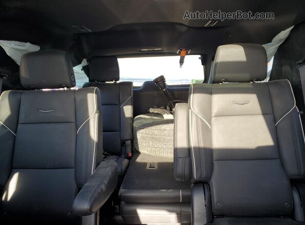 1GYS4EKL0PR338399 2023 CADILLAC ESCALADE Red Rear seats view