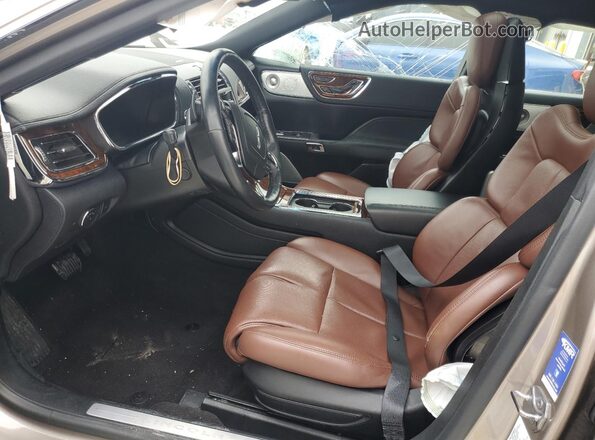 1LN6L9NP8K5606675 2019 LINCOLN CONTINENTA Brown წინა სალონის ხედი