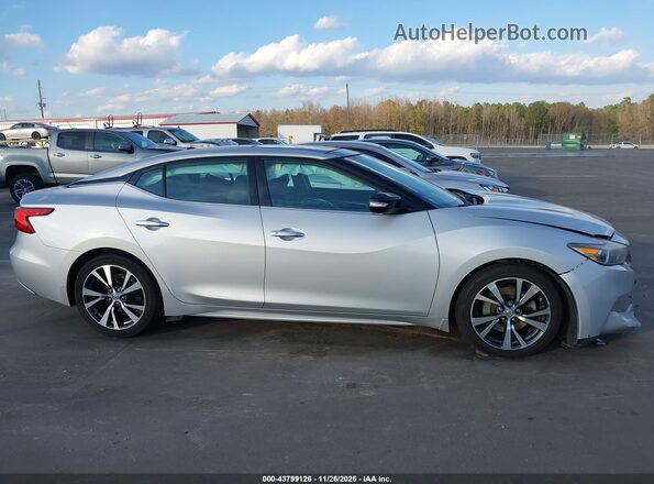 1N4AA6AP9HC430013 2017 NISSAN MAXIMA Silver Widok wnętrza z tyłu