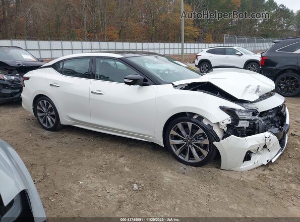1N4AA6FV8PC501000 2023 NISSAN MAXIMA PLATINUM Белый Вид задней части салона