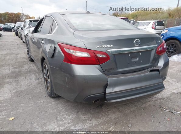 1N4AL3AP8JC105710 2018 NISSAN ALTIMA Silver Trasero izquierdo