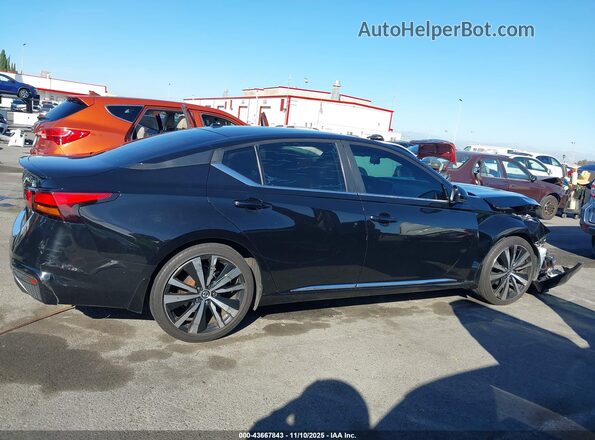 1N4BL4CV4LN306467 2020 NISSAN ALTIMA Черный Вид задней части салона