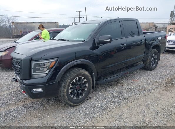 1N6AA1ED5RN100613 2024 NISSAN TITAN Черный Передняя левая четверть