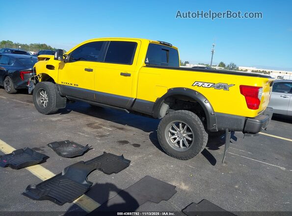 1N6BA1F47HN542729 2017 NISSAN TITAN XD Yellow Trasero izquierdo