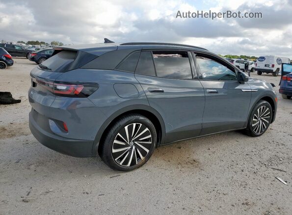 1V25MPE82RC000979 2024 VOLKSWAGEN ID.4 Серый 