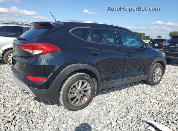 KM8J33A2XGU165002 2016 HYUNDAI TUCSON Black 