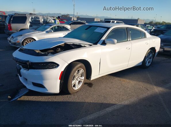 2C3CDXBG2NH219506 2022 DODGE CHARGER White Vista tres cuartos delantera izquierda
