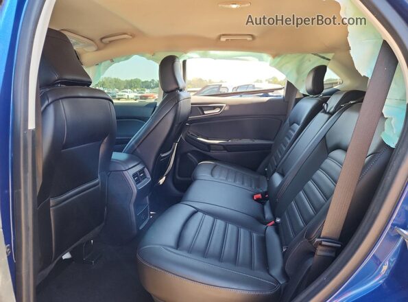 2FMPK4J93NBA52768 2022 FORD EDGE Blue Widok wnętrza z tyłu