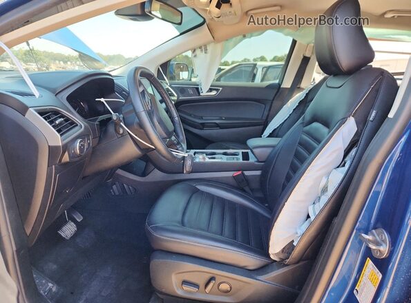 2FMPK4J93NBA52768 2022 FORD EDGE Blue Widok wnętrza z przodu