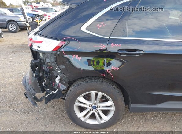 2FMPK4J95LBA92475 2020 FORD EDGE Black Front view