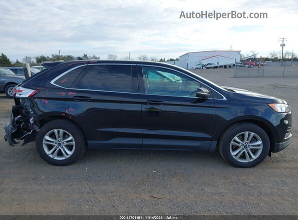 2FMPK4J95LBA92475 2020 FORD EDGE Black Rear interior view