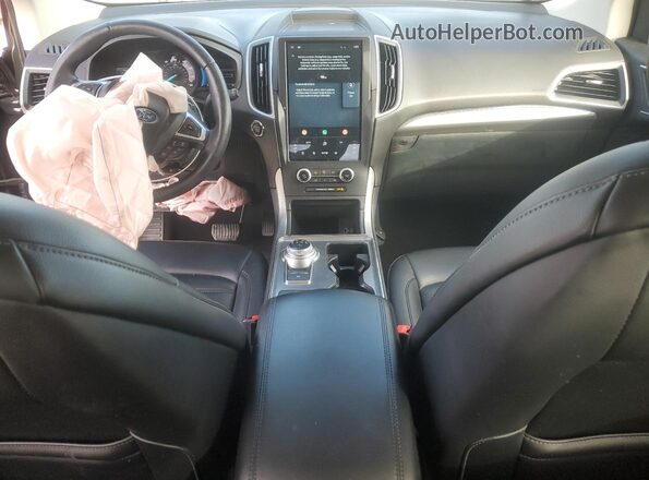 2FMPK4J95NBB11710 2022 FORD EDGE Зеленый Вид панели приборов