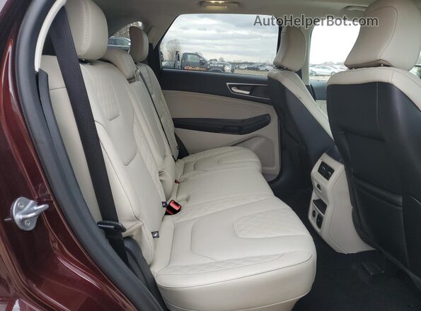 2FMPK4K92RBA73132 2024 FORD EDGE Burgundy Vista interior trasera