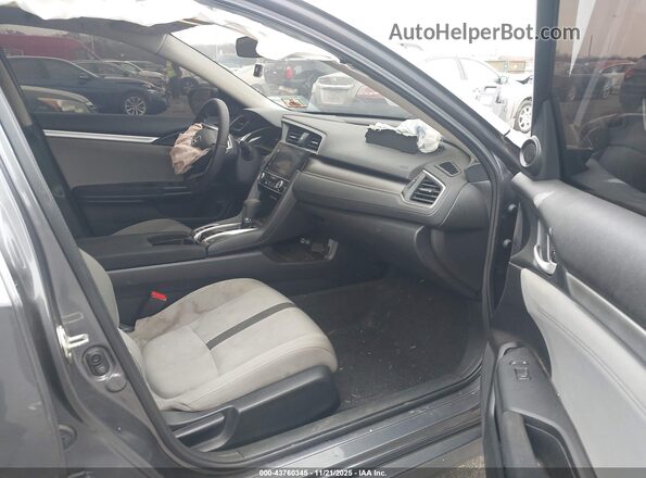 2HGFC2F70JH588286 2018 HONDA CIVIC Серый Вид салона спереди