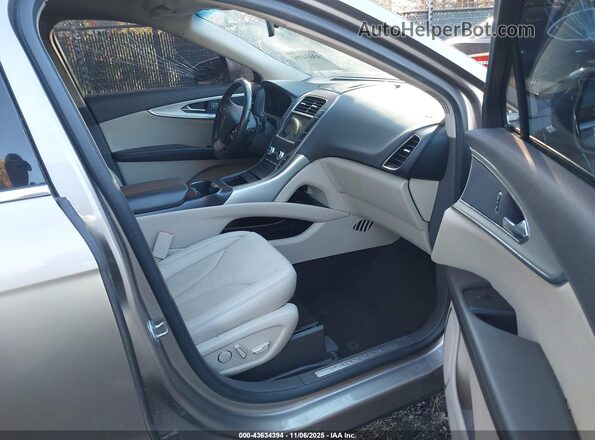 2LMPJ6J90LBL35144 2020 LINCOLN NAUTILUS Brown Front interior view