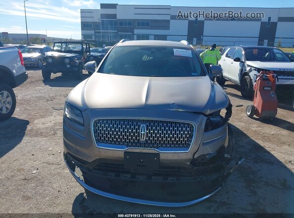 2LMPJ6J90MBL14022 2021 LINCOLN NAUTILUS Brown ხელსაწყოთა პანელის ხედი
