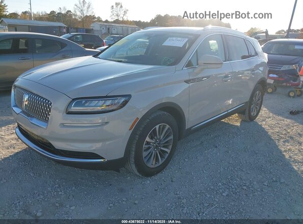 2LMPJ6J91NBL08134 2022 LINCOLN NAUTILUS Cream Vista tres cuartos delantera izquierda
