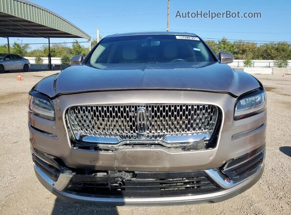 2LMPJ8J9XLBL28052 2020 LINCOLN NAUTILUS Gold Front view
