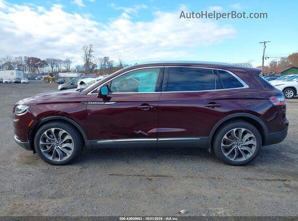 2LMPJ8K9XNBL25086 2022 LINCOLN NAUTILUS Maroon Vista interior trasera