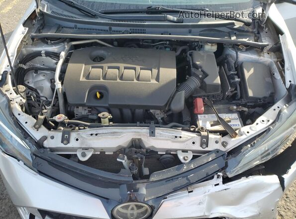 2T1BURHE4JC033656 2018 TOYOTA LL Silver Widok wnętrza z tyłu