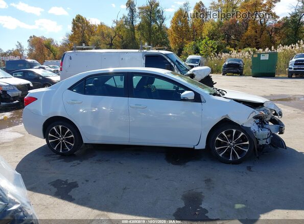 2T1BURHE5JC057237 2018 TOYOTA LL White Սալոնի հետևի տեսք