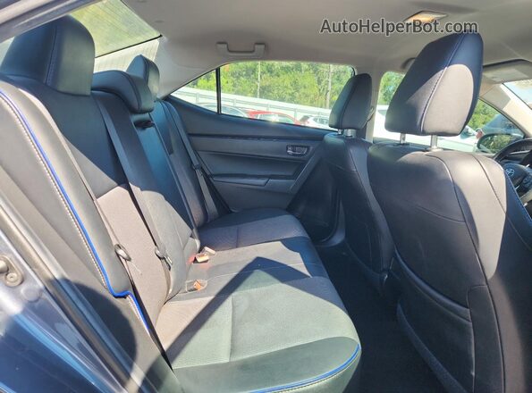 2T1BURHE8JC050587 2018 TOYOTA LL Gray Vista de los asientos traseros