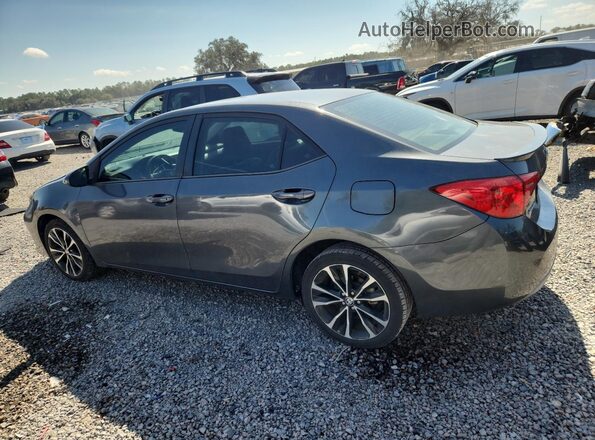 2T1BURHE8JC050587 2018 TOYOTA LL Gray Trasero izquierdo