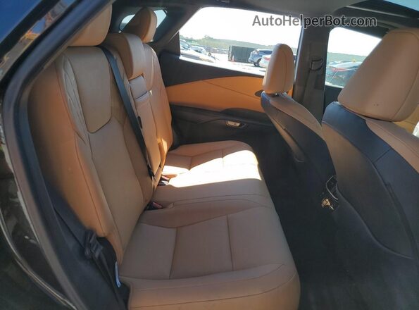2T2BAMCA6RC072286 2024 LEXUS RX Black Vista interior trasera