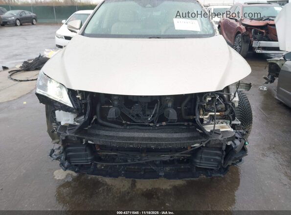 2T2BGMCA1HC019573 2017 LEXUS RX 450H Золотой Вид спереди