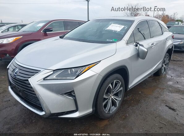 2T2BGMCA7GC006776 2016 LEXUS RX 450H Silver წინა მარცხენა ხედი სამი მეოთხედიდან