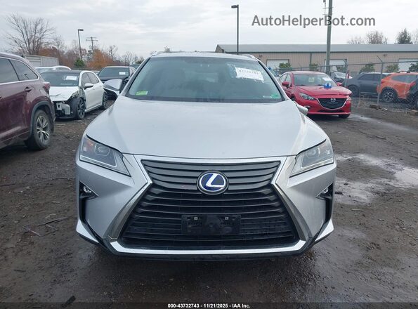 2T2BGMCA7GC006776 2016 LEXUS RX 450H Silver უკანა სალონის ხედი