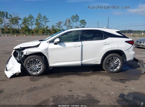 2T2JGMDA3MC064471 2021 LEXUS RX 450H White Vista interior trasera