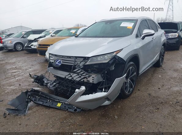 2T2ZFMCA7GC001336 2016 LEXUS RX 450H Silver Vista tres cuartos delantera izquierda