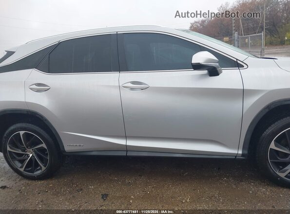 2T2ZFMCA7GC001336 2016 LEXUS RX 450H Silver Vista interior trasera