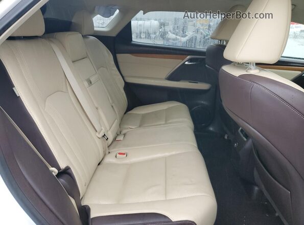 2T2ZZMCA5GC010897 2016 LEXUS RX White Vista interior trasera
