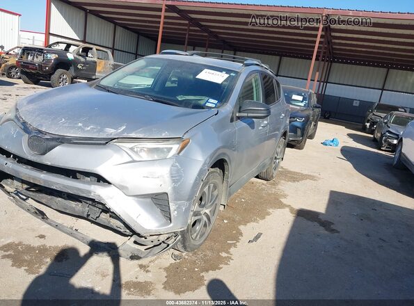 2T3BFREV3GW512292 2016 TOYOTA LE Серебряный Передняя левая четверть