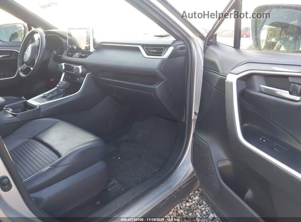 2T3E6RFV0MW021525 2021 TOYOTA RAV4 HYBRID Light Blue Widok wnętrza z przodu